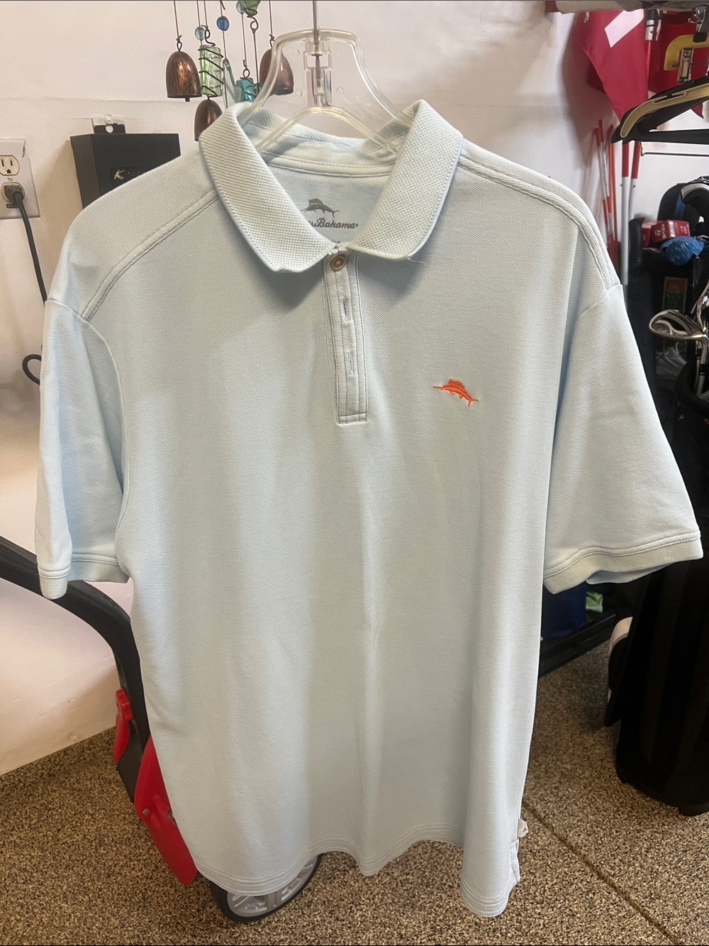 Tommy Bahama Pale Blue Polo with Orange Dolphin Logo